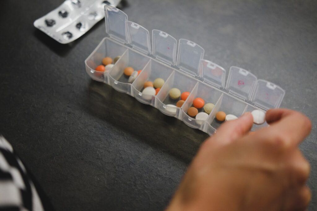 Pharmaceutical laboratory technician reviewing a Certificate of Analysis document for active pharmaceutical ingredient quality verification