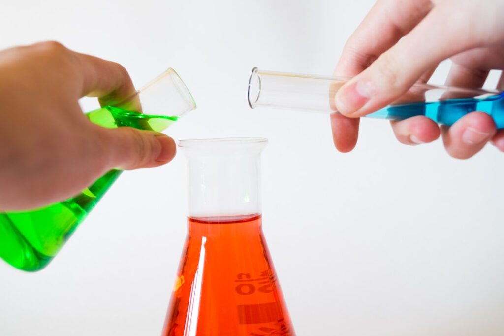 Scientist performing quality control testing on pharmaceutical active pharmaceutical ingredients in a laboratory setting
